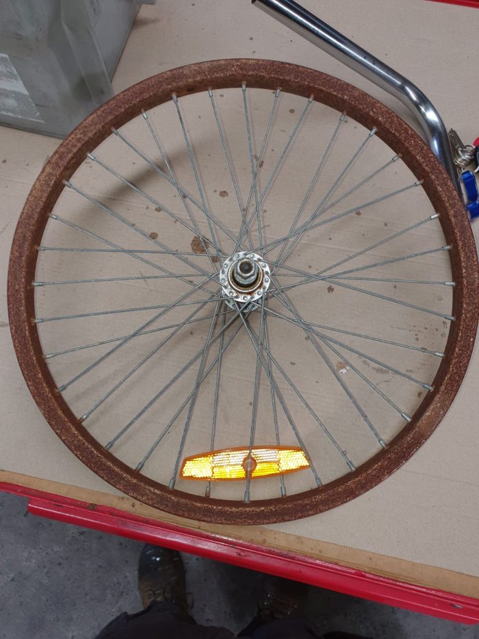 Heavily rusted bike rim